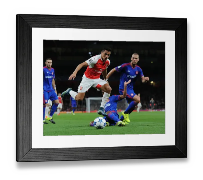 Framed Print : Arsenal's Alexis Sanchez vs. Olympiacos Felipe Pardo: A Clash of Stars in the 2015 / 16 Champions League