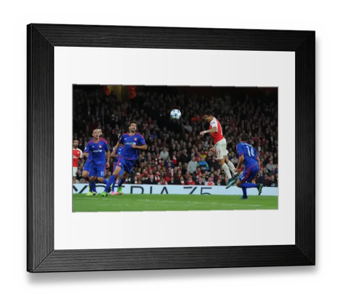 Framed Print : Arsenal vs Olympiacos: UEFA Champions League Showdown at Emirates Stadium Framed Print : Arsenal vs Olympiacos: UEFA Champions League Showdown at Emirates Stadium