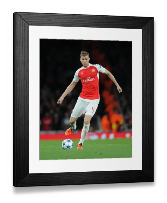 Framed Print : Per Mertesacker in Action: Arsenal vs. Olympiacos, UEFA Champions League 2015 / 16