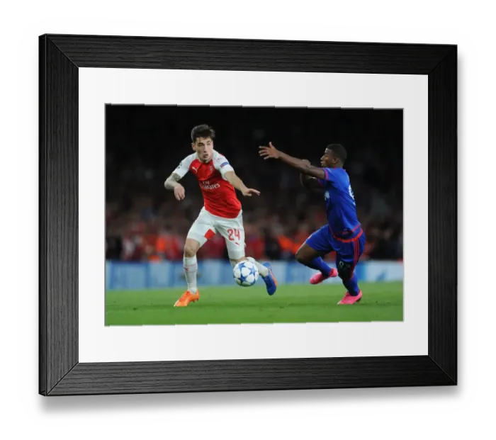 Framed Print : Arsenal's Bellerin vs. Seba: A Champion's Clash in the 2015 Arsenal v Olympiacos Showdown