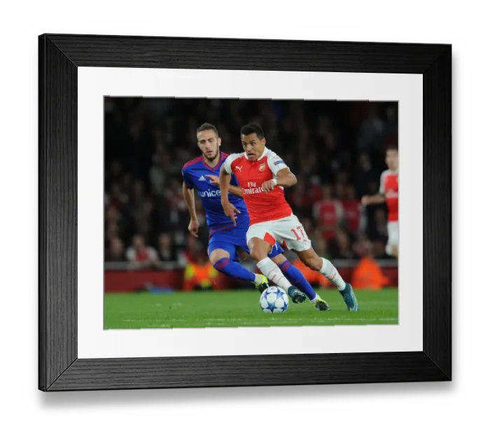 Framed Print : Arsenal's Alexis Sanchez vs. Olympiacos Kostas Fortounis: A 2015 / 16 Champions League Showdown Framed Print : Arsenal's Alexis Sanchez vs. Olympiacos Kostas Fortounis: A 2015 / 16 Champions League Showdown