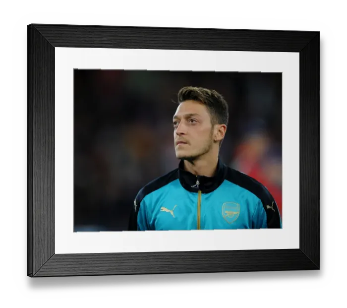 Framed Print : Mesut Ozil's Focus: Arsenal's Pre-Match Preparation vs Olympiacos (September 2015) Framed Print : Mesut Ozil's Focus: Arsenal's Pre-Match Preparation vs Olympiacos (September 2015)