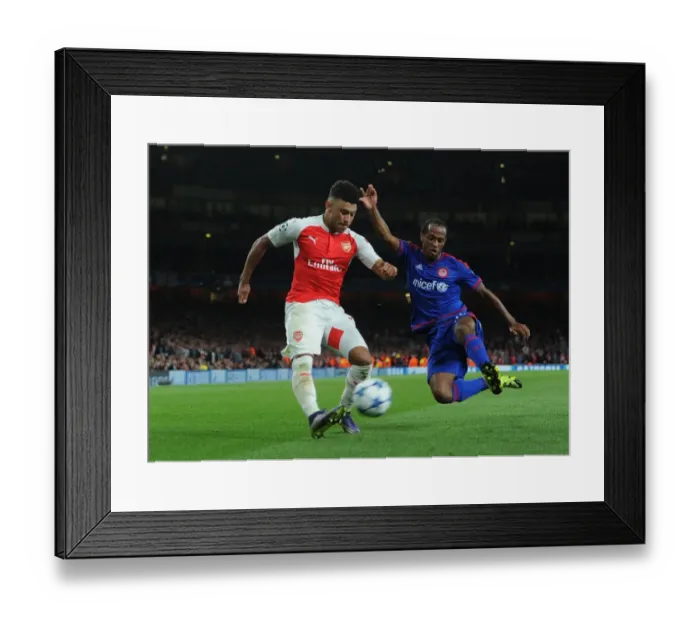 Framed Print : Arsenal's Oxlade-Chamberlain vs. Salino: A UCL Showdown Framed Print : Arsenal's Oxlade-Chamberlain vs. Salino: A UCL Showdown