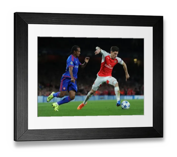 Framed Print : Bellerin vs. Salino: Clash in the Champions League between Arsenal's Hector Bellerin and Olympiacos Leandro Salino