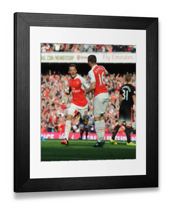 Framed Print : Arsenal's Ozil and Ramsey Celebrate Double Strike Against Manchester United (2015 / 16) Framed Print : Arsenal's Ozil and Ramsey Celebrate Double Strike Against Manchester United (2015 / 16)