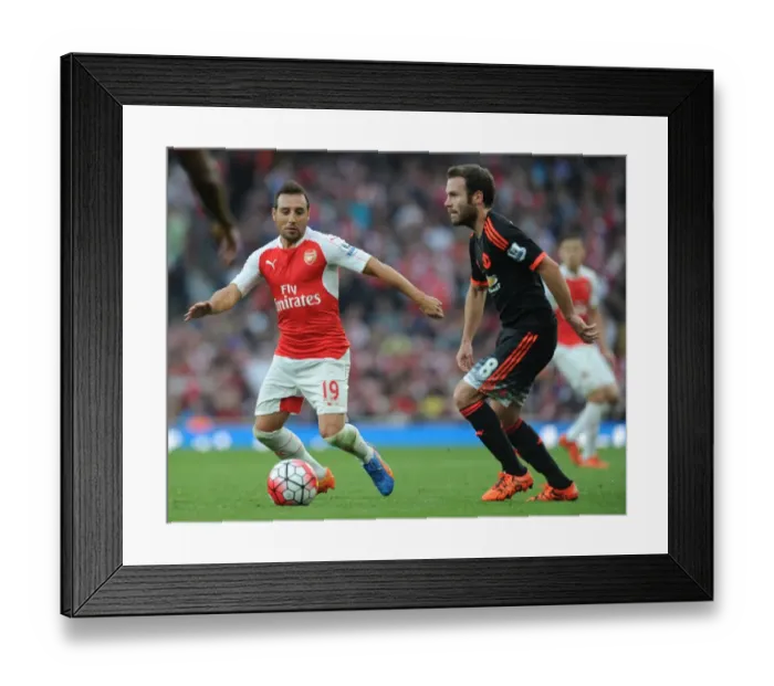 Framed Print : Arsenal's Santi Cazorla Outsmarts Juan Mata: A Moment of Magic from the 2015 / 16 Premier League Clash Framed Print : Arsenal's Santi Cazorla Outsmarts Juan Mata: A Moment of Magic from the 2015 / 16 Premier League Clash