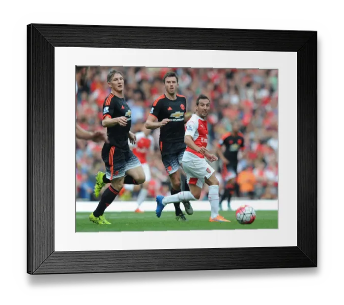 Framed Print : Arsenal's Santi Cazorla Outsmarts Manchester United's Schweinsteiger and Carrick Framed Print : Arsenal's Santi Cazorla Outsmarts Manchester United's Schweinsteiger and Carrick