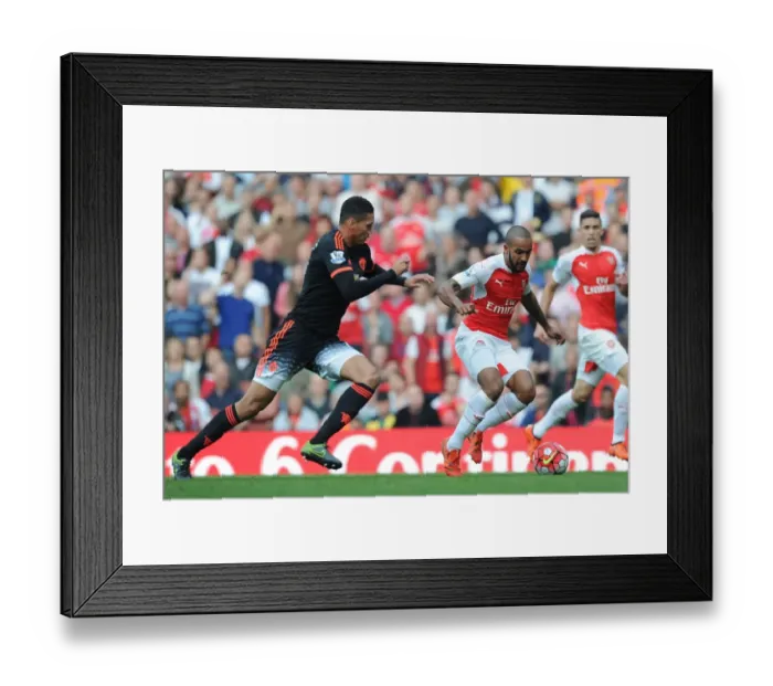 Framed Print : Theo Walcott Outruns Chris Smalling: Thrilling Moment from Arsenal vs Manchester United, Premier League 2015 / 16 Framed Print : Theo Walcott Outruns Chris Smalling: Thrilling Moment from Arsenal vs Manchester United, Premier League 2015 / 16