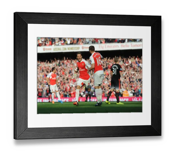 Framed Print : Arsenal's Ozil and Ramsey: Celebrating Goals Against Manchester United in the 2015 / 16 Premier League