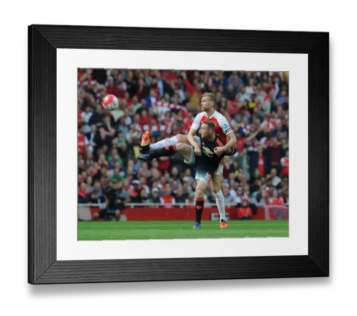 Framed Print : Clash of Titans: Per Mertesacker vs Wayne Rooney - Arsenal vs Manchester United Framed Print : Clash of Titans: Per Mertesacker vs Wayne Rooney - Arsenal vs Manchester United