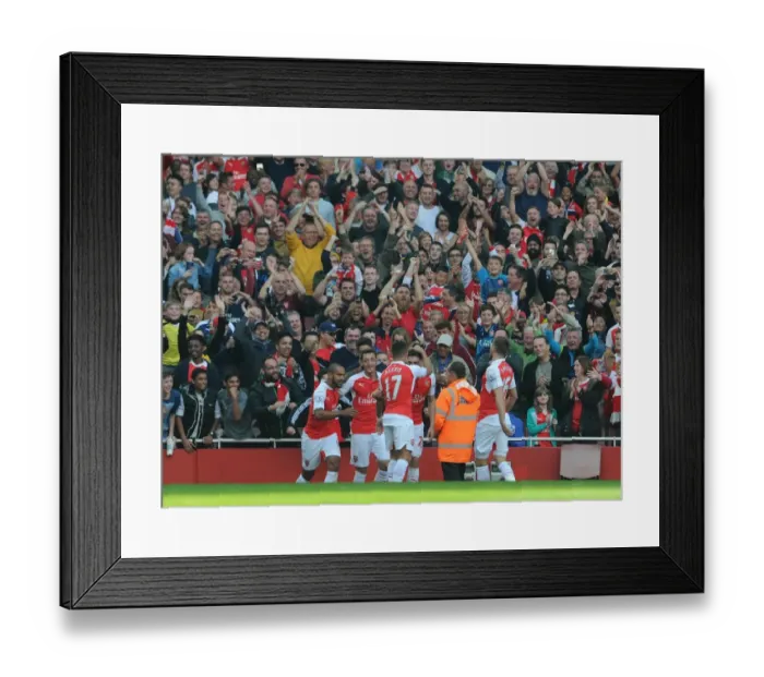 Framed Print : Mesut Ozil celebrates Arsenals 2nd goal with his team mates Framed Print : Mesut Ozil celebrates Arsenals 2nd goal with his team mates