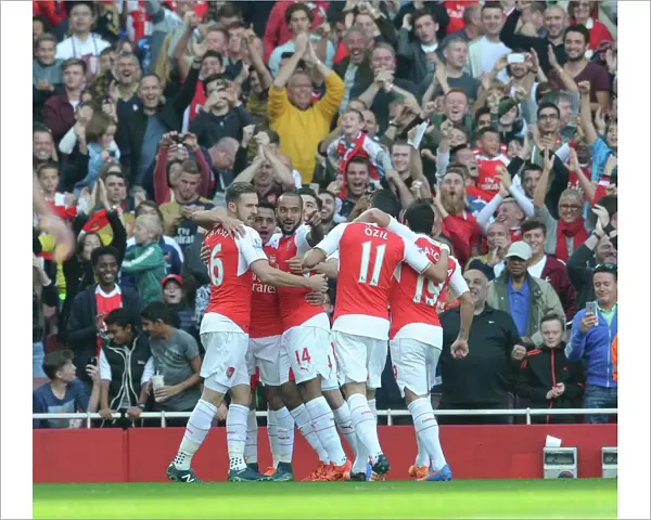 Alexis Sanchez celebrates scoring his 1st goal with his team mates