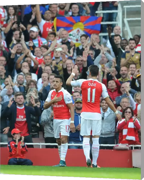 Alexis Sanchez celebrates scoring his 2nd goal, Arsenals 3rd, with his Mesut Ozil