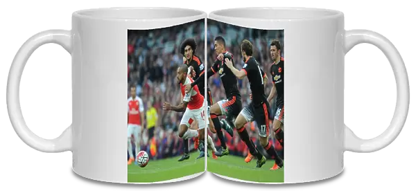Theo Walcott (Arsenal) Marouane Fellaini, Chris Smalling and Daley Blind (Man Utd)
