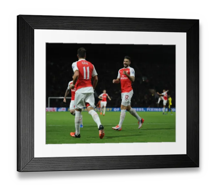 Framed Print : Arsenal's Olivier Giroud and Mesut Ozil Celebrate Goal Scoring Duo Against Watford (2015 / 16)