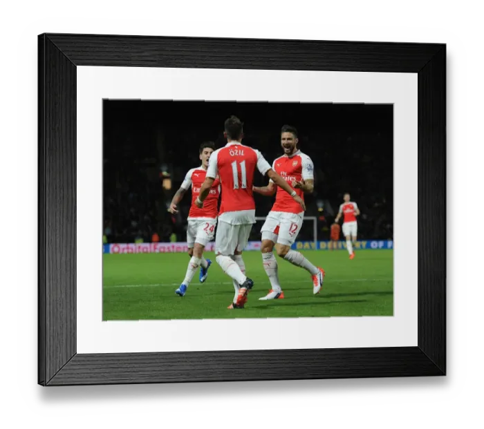 Framed Print : Arsenal's Giroud and Ozil: A Goal Scoring Duo in Action against Watford (2015 / 16)