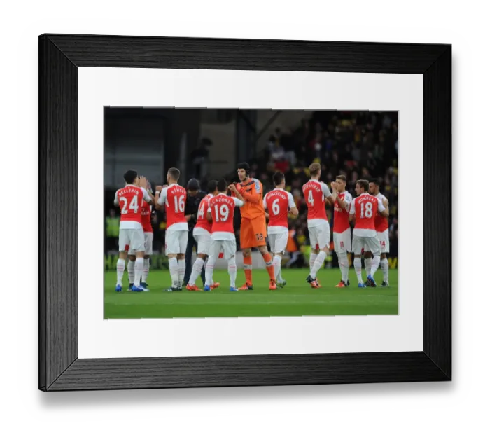 Framed Print : Petr Cech (Arsenal) with his team mates before