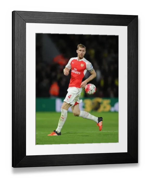Framed Print : Per Mertesacker's Focus: Arsenal vs Watford Premier League Showdown (2015)