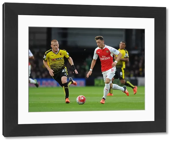 Ozil vs Watson: A Premier League Showdown - Arsenal's Mesut Ozil Clashes with Watford's Ben Watson