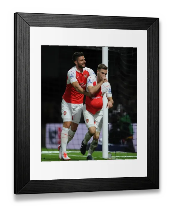 Framed Print : Arsenal's Unstoppable Duo: Ramsey and Giroud's Goal Celebrations vs. Watford (2015 / 16) Framed Print : Arsenal's Unstoppable Duo: Ramsey and Giroud's Goal Celebrations vs. Watford (2015 / 16)