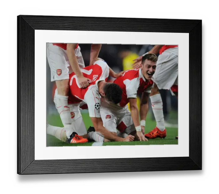 Framed Print : Mesut Ozil Scores the Decisive Goal: Arsenal's Victory over Bayern Munich in the UEFA Champions League, 2015