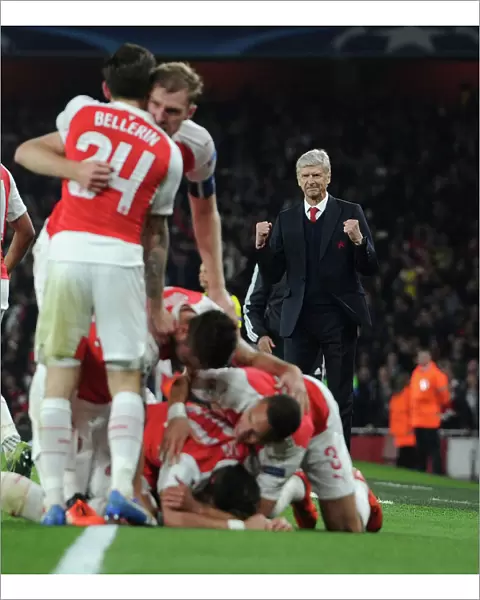 Arsenal's Champions League Triumph: Wenger and Ozil Celebrate Second Goal Against Bayern Munich