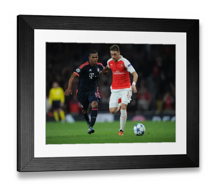 Framed Print : Mesut Ozil Breaks Past Douglas Costa: Arsenal FC vs. FC Bayern Munchen, UEFA Champions League, 2015