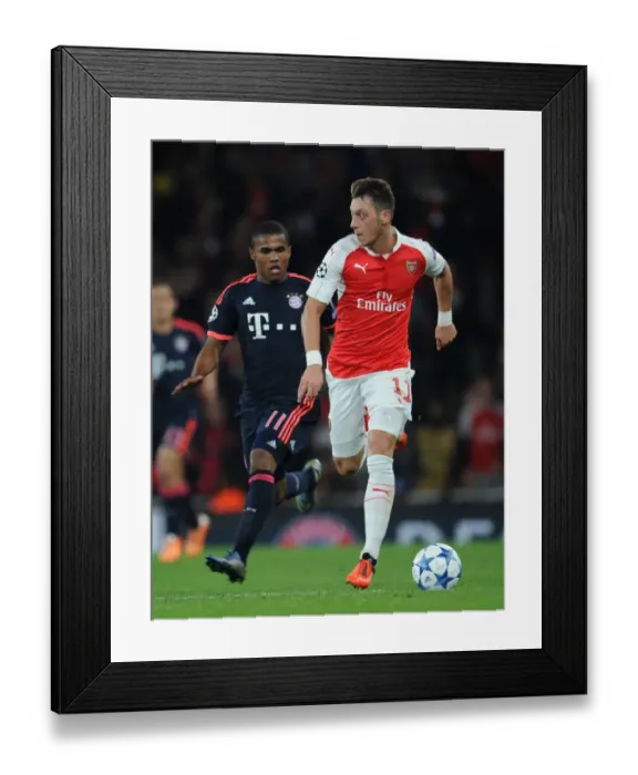 Framed Print : Mesut Ozil Outmaneuvers Douglas Costa: Arsenal FC vs. FC Bayern Munich, UEFA Champions League, 2015