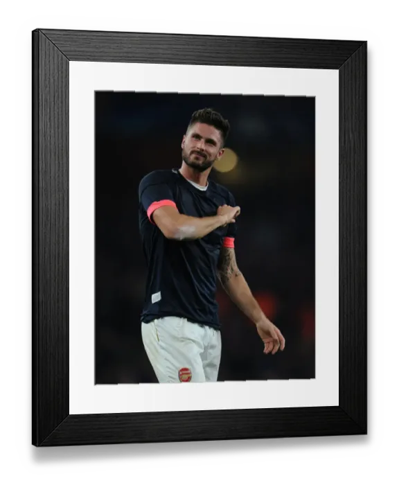 Framed Print : Olivier Giroud's Euphoric Moment: Arsenal's Stunner Against Bayern Munich in the Champions League