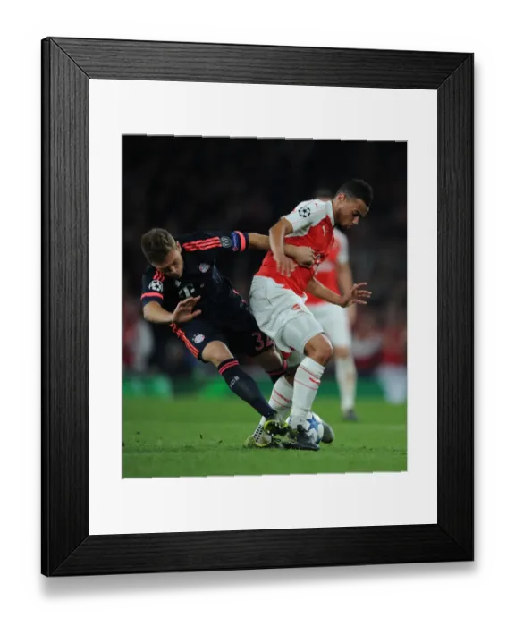 Framed Print : Clash of Titans: Arsenal vs. Bayern Munich in the UEFA Champions League