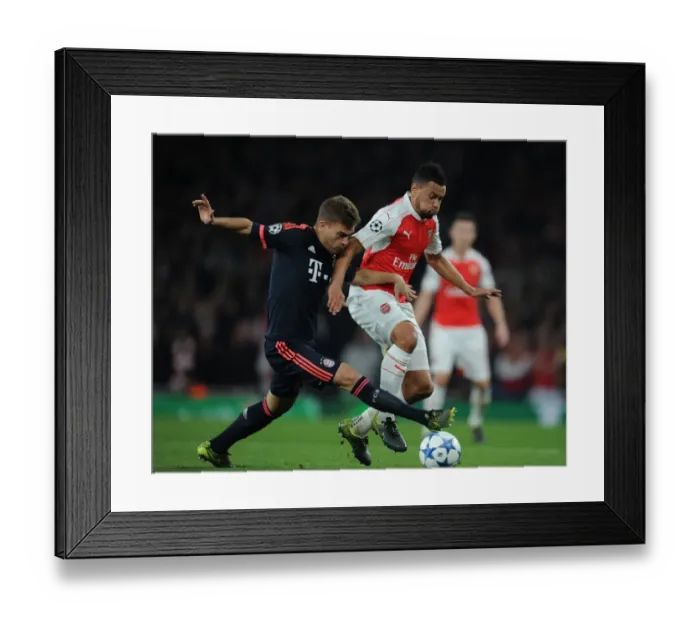 Framed Print : Clash of Titans: Arsenal vs. Bayern Munich in the Champions League