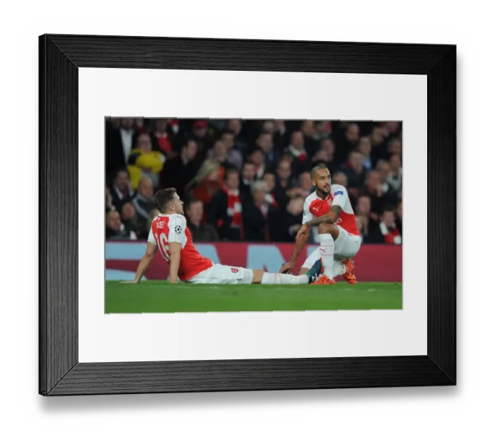 Framed Print : Arsenal FC: Walcott Comforts Injured Ramsey Amidst 2015 / 16 UEFA Champions League Battle Against FC Bayern Munchen