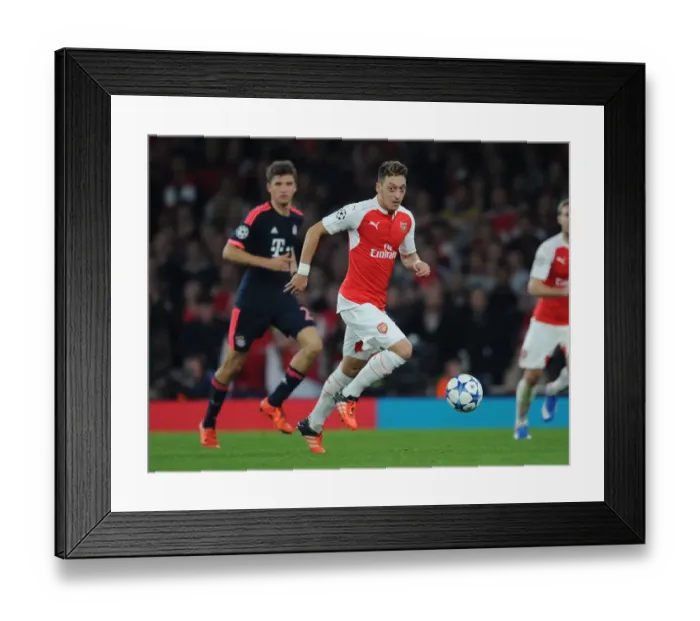Framed Print : Mesut Ozil in Action: Arsenal FC vs. FC Bayern Munchen - UEFA Champions League 2015 / 16