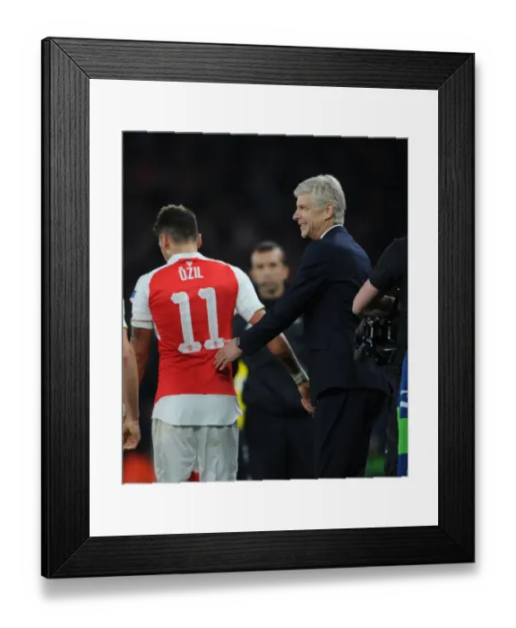 Framed Print : Arsene Wenger and Mesut Ozil: Celebrating Arsenal's Goal Against Bayern Munich in the 2015 Champions League Framed Print : Arsene Wenger and Mesut Ozil: Celebrating Arsenal's Goal Against Bayern Munich in the 2015 Champions League