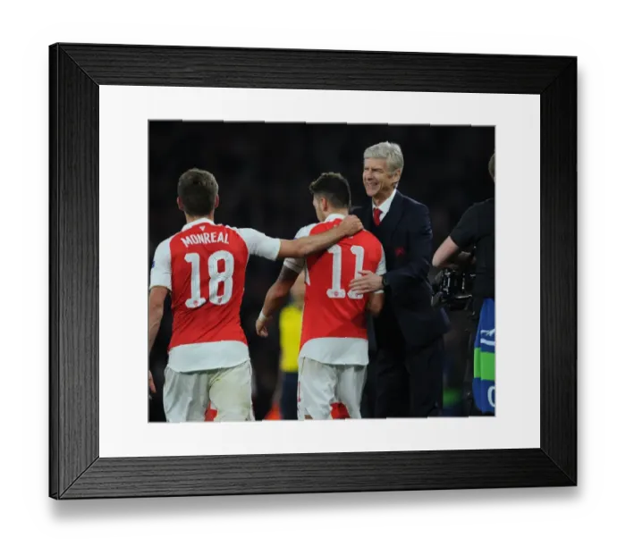 Framed Print : Arsenal's Ozil Scores Stunning Goal Against Bayern Munich in Champions League: Wenger and Monreal Reaction Framed Print : Arsenal's Ozil Scores Stunning Goal Against Bayern Munich in Champions League: Wenger and Monreal Reaction