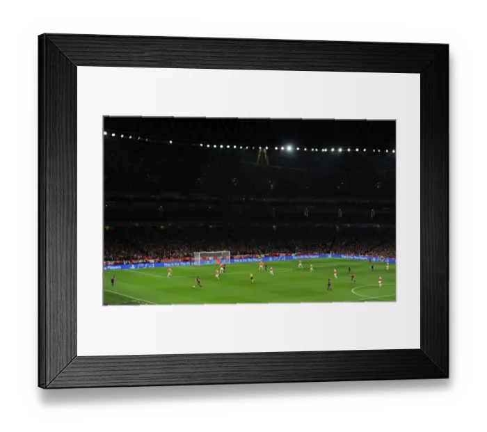 Framed Print : Arsenal FC vs. FC Bayern Munich: UEFA Champions League Showdown at Emirates Stadium, London