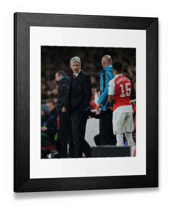 Framed Print : Arsene Wenger Consults with Alex Oxlade-Chamberlain during Arsenal vs. Bayern Munich UCL Match (2015) Framed Print : Arsene Wenger Consults with Alex Oxlade-Chamberlain during Arsenal vs. Bayern Munich UCL Match (2015)