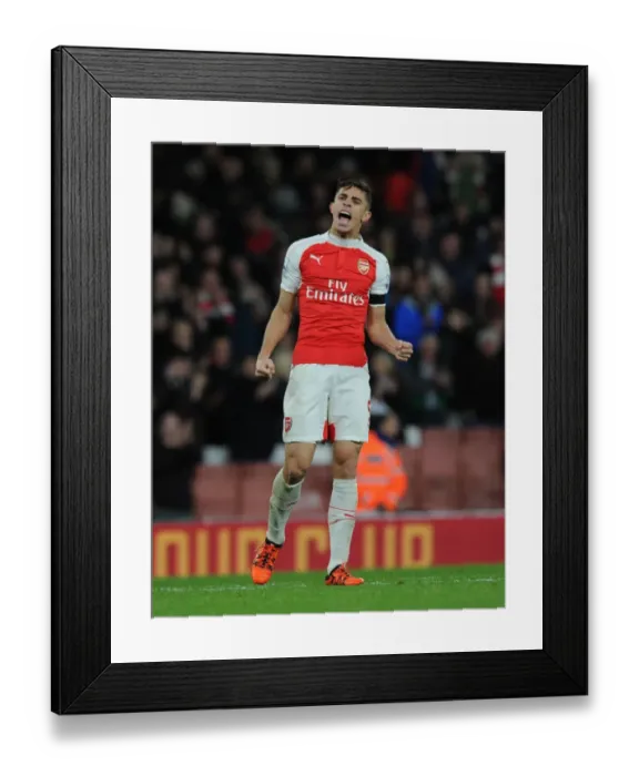 Framed Print : Gabriel's Triumph: Arsenal Defender Celebrates Victory Over Everton (2015 / 16)