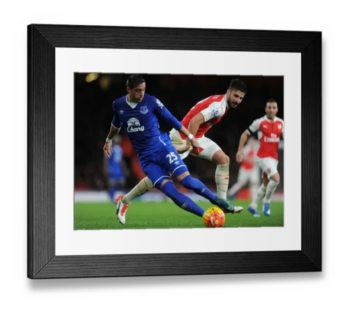 Framed Print : Clash at Emirates: Giroud vs. Funes Mori - A Football Battle