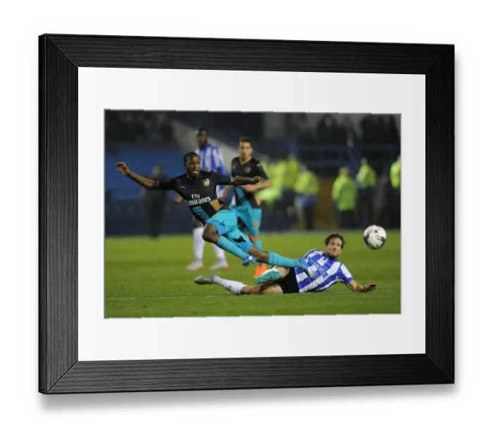 Framed Print : Intense Battle: Sheffield Wednesday vs. Arsenal in Capital One Cup Fourth Round