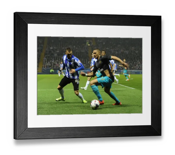 Framed Print : Arsenal's Kieran Gibbs Goes Head-to-Head with Jack Hunt in Capital One Cup Showdown Framed Print : Arsenal's Kieran Gibbs Goes Head-to-Head with Jack Hunt in Capital One Cup Showdown