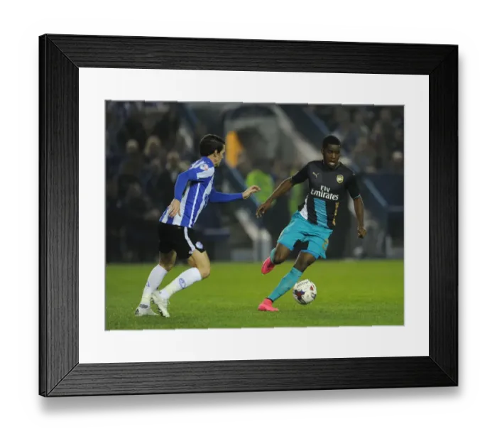 Framed Print : Joel Campbell vs Kieran Lee: Clash in the Capital One Cup between Arsenal and Sheffield Wednesday Framed Print : Joel Campbell vs Kieran Lee: Clash in the Capital One Cup between Arsenal and Sheffield Wednesday