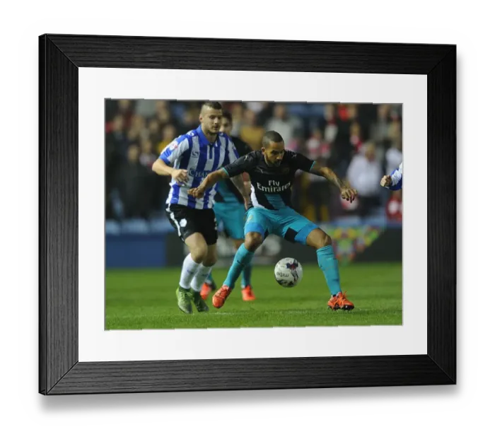 Framed Print : Theo Walcott vs Daniel Pudil: A Football Rivalry in the Capital One Cup - Sheffield Wednesday vs Arsenal Framed Print : Theo Walcott vs Daniel Pudil: A Football Rivalry in the Capital One Cup - Sheffield Wednesday vs Arsenal