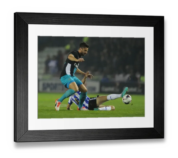 Framed Print : Giroud vs. Hutchinson: A Football Rivalry in the Capital One Cup - Sheffield Wednesday vs. Arsenal Framed Print : Giroud vs. Hutchinson: A Football Rivalry in the Capital One Cup - Sheffield Wednesday vs. Arsenal