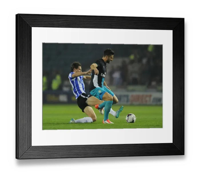 Framed Print : Giroud vs Hutchinson: A Fierce Rivalry in the Capital One Cup - Arsenal vs Sheffield Wednesday (2015-16)