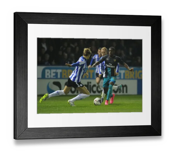 Framed Print : Campbell vs Loovens: A Football Rivalry in the Capital One Cup - Sheffield Wednesday vs Arsenal Framed Print : Campbell vs Loovens: A Football Rivalry in the Capital One Cup - Sheffield Wednesday vs Arsenal