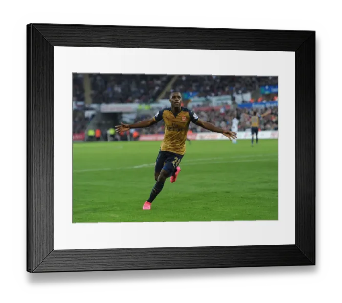 Framed Print : Arsenal's Joel Campbell Scores Hat-Trick: Dominant Performance Against Swansea City in Premier League Framed Print : Arsenal's Joel Campbell Scores Hat-Trick: Dominant Performance Against Swansea City in Premier League