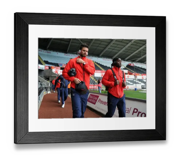 Framed Print : Arsenal Stars Giroud and Campbell Arrive at Swansea City's Liberty Stadium Ahead of 2015-16 Premier League Clash