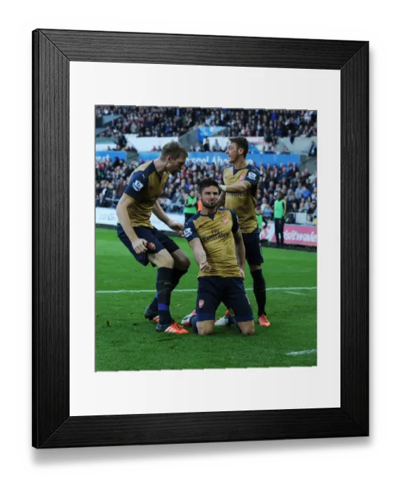 Framed Print : Arsenal Triumph: Giroud, Ozil, Mertesacker Celebrate Goal Against Swansea City (2015-16) Framed Print : Arsenal Triumph: Giroud, Ozil, Mertesacker Celebrate Goal Against Swansea City (2015-16)