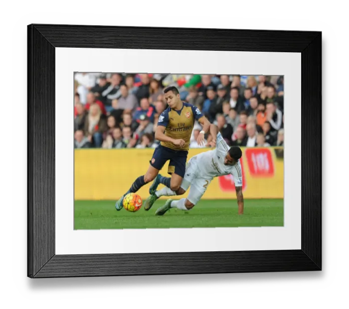Framed Print : Sanchez vs. Naughton: Intense Clash in Swansea City vs. Arsenal (2015-16) Framed Print : Sanchez vs. Naughton: Intense Clash in Swansea City vs. Arsenal (2015-16)